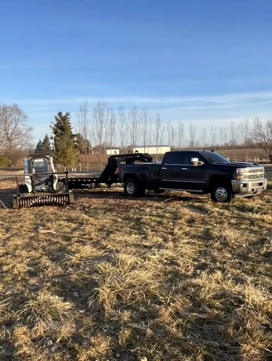 UE Landworks equipment being transported to a debris removal job site, Fulton County Ohio